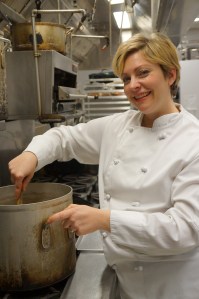 Woman chef in professional kitchen