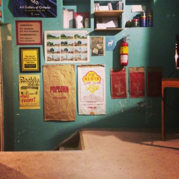 Projection room with posters on the wall