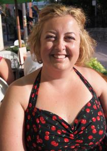 Woman wearing cherry dress