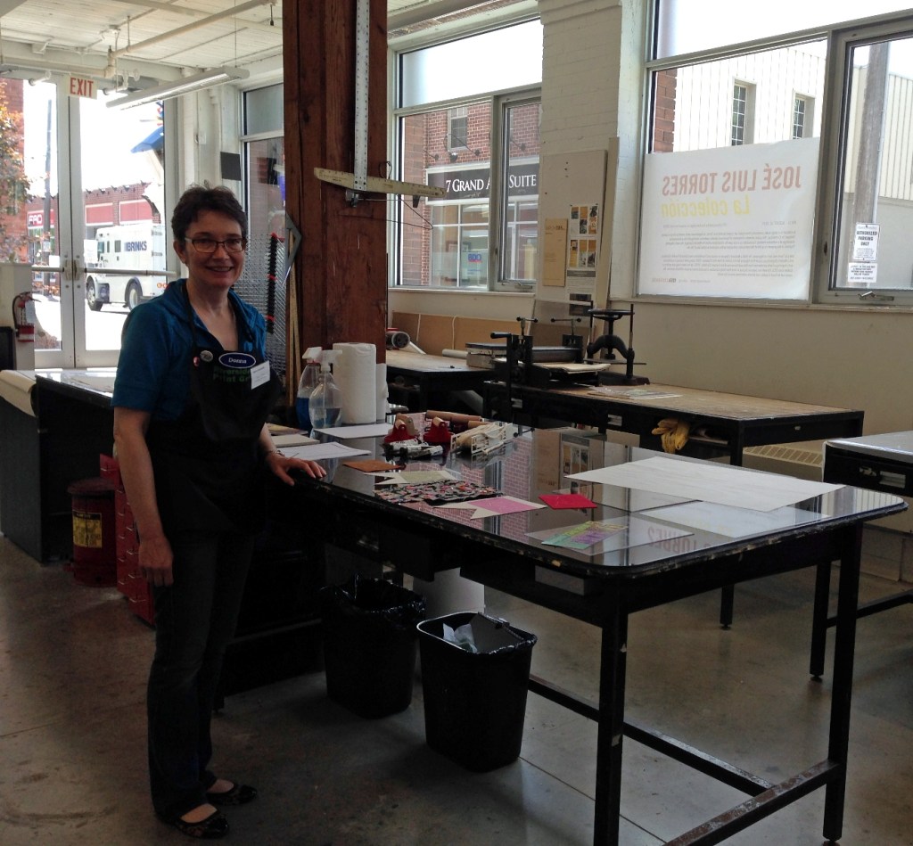 woman standing in printmaking studio
