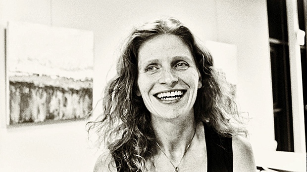 smiling woman in black and white