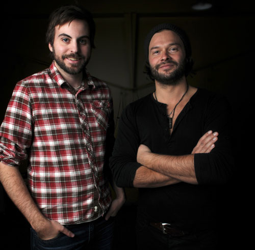 Man in plaid shirt, man with skull cap