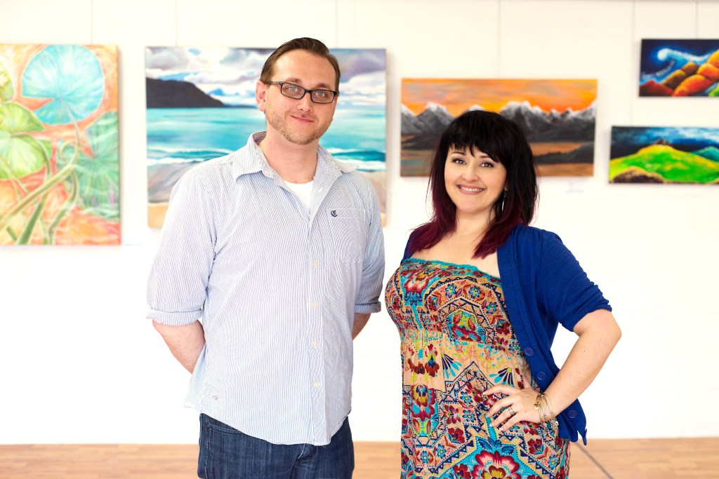 Man and woman in art gallery