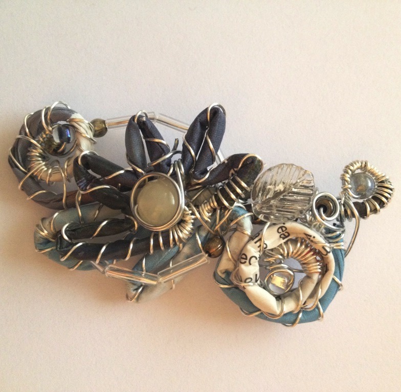 Wire and metal brooch 