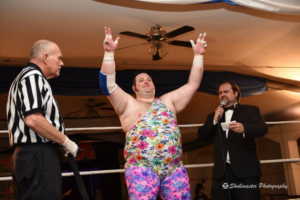 Wrestler in floral tights in ring