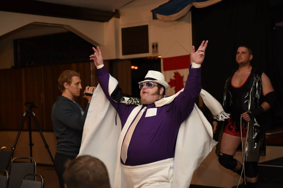 Wrestler in cape and wild outfit 