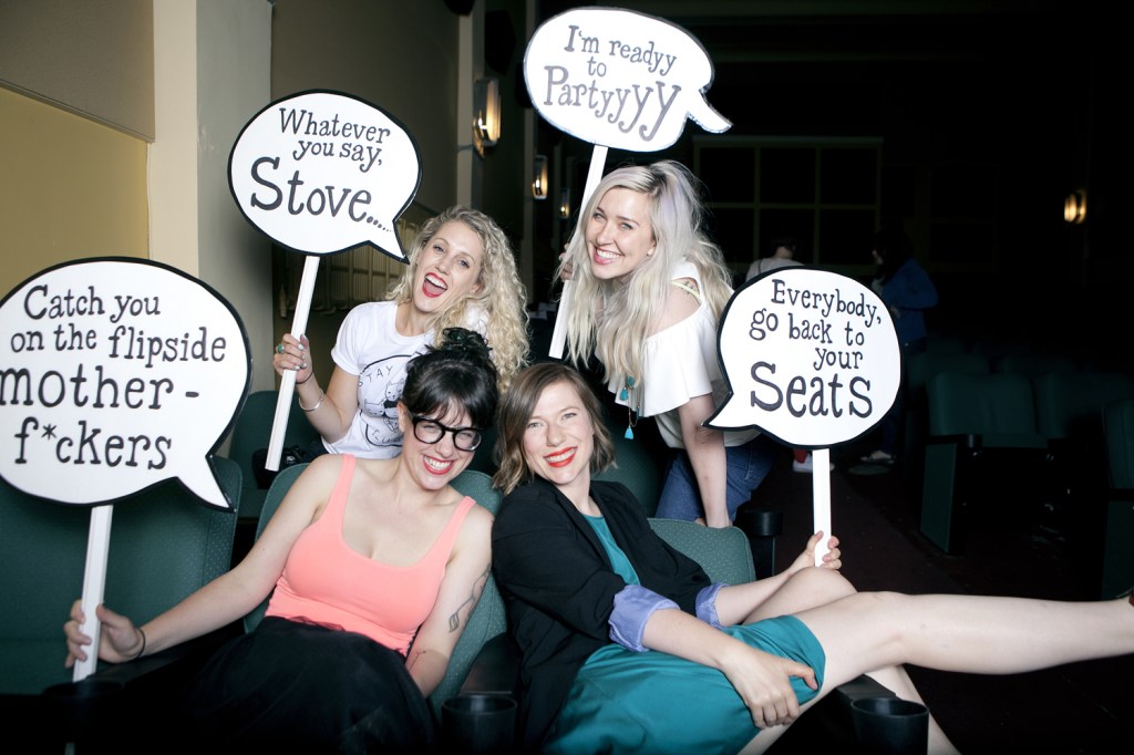 Four women with signs