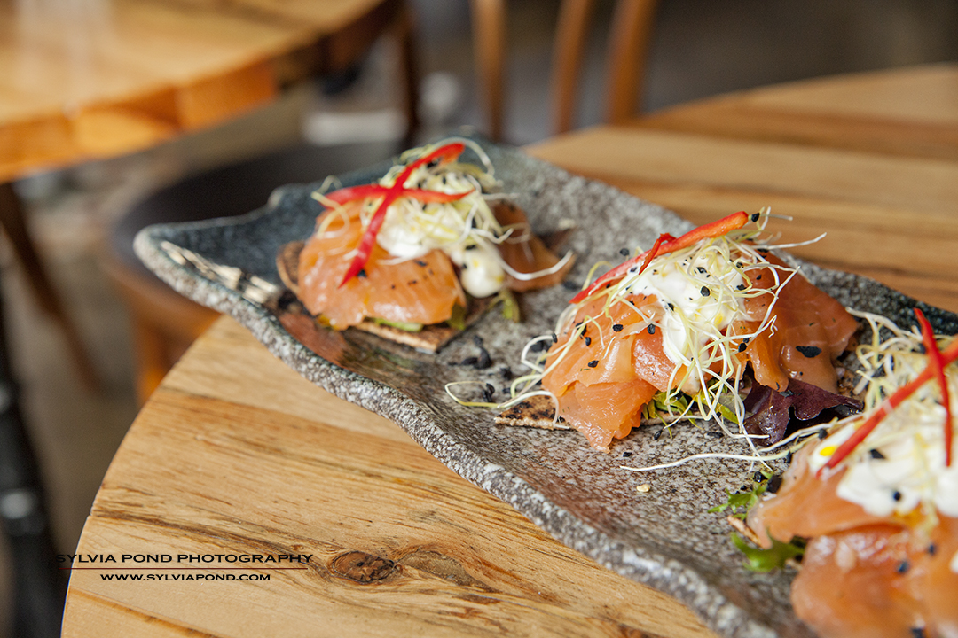 salmon appetizer on grey plate